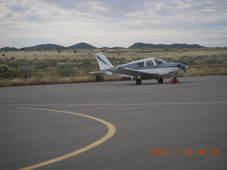 197 7dl. Elizabeth running and N8377W at Bagdad Airport (E51)