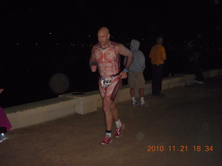 Arizona Ironman - muscle man runner after dark