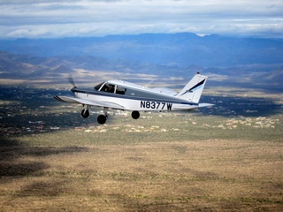 239 7ej. Sean picture - aerial - N8377W in flight