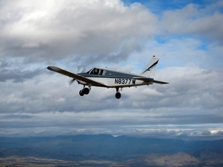 243 7ej. Sean picture - aerial - N8377W in flight