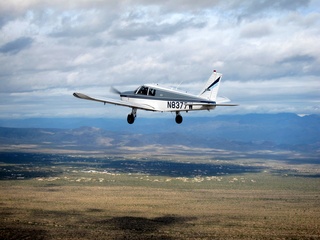 244 7ej. Sean picture - aerial - N8377W in flight