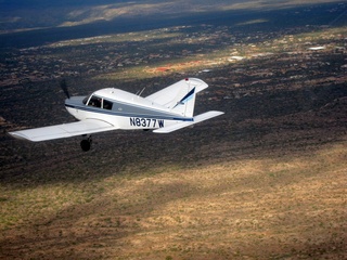 264 7ej. Sean picture -  aerial - N8377W in flight