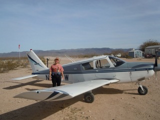 103 7g6. Antoine's pictures - Adam and N8377W at Alamo Lake airstrip