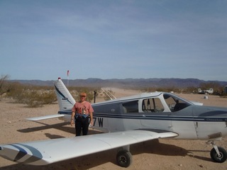 217 7g6. Antoine's pictures - Adam and N8377W at Alamo Lake airstrip