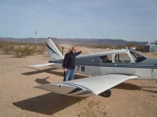 293 7g6. Antoine's pictures - Antoine and N8377W at Alamo Lake airstrip