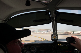 Sky Harbor fly-in - taxiing at PHX in N8377W - silhouette