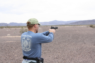 V.N.G.R.N. - Adam shooting with a puff of smoke from the gun