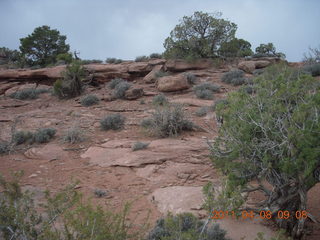 Anticline Overlook - someone driving on dirt road below