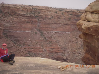 1441 7j8. Canyonlands Needles Slickrock hike - Adam (tripod)