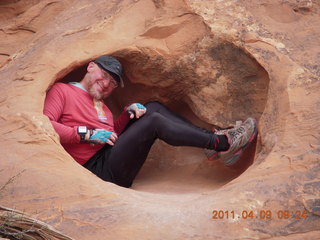 1448 7j9. Arches Devil's Garden hike - Adam in hole in rock