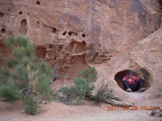 1451 7j9. Arches Devil's Garden hike - Adam in hole in rock