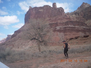 Canyonlands Lathrop hike/run - Adam at riverside picnic table at (tripod)