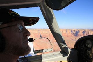 204 7pq. Ruhil pictures - Adam flying N8377W in Marble Canyon