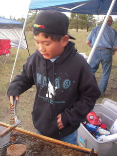 Negrito fly-in - helper cooking burgers