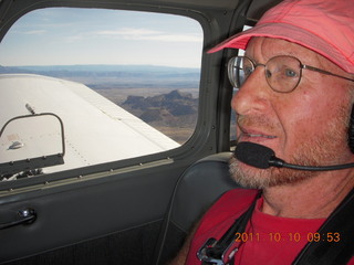 Adam flying N8377W