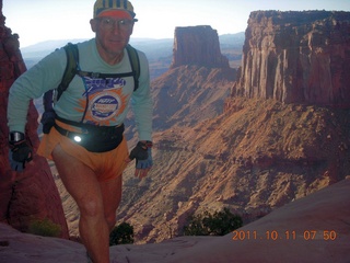 Canyonlands National Park - Lathrop trail hike - Adam hiking - back (tripod)