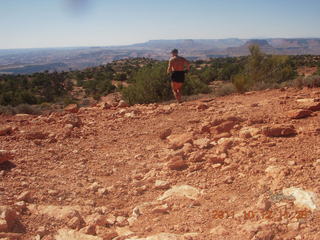 Canyonlands National Park - Murphy run - Adam running - back (tripod)