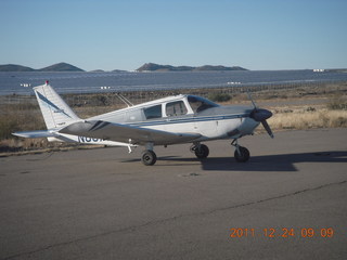 720 7sq. N8377W and solar panels (I think) at Bagdad Airport (E51)