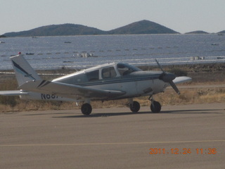 721 7sq. N8377W and solar panels (I think) at Bagdad Airport (E51)