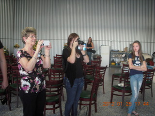 Ken Calman memorial - people taking pictures of Ken's family