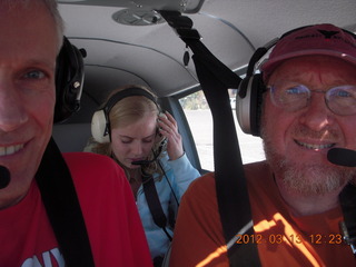 769 7vd. half of Jerry and Carolyn and Adam flying in N8377W