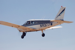 822 7wx. N8377W in flight