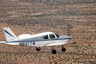 824 7wx. N8377W in flight