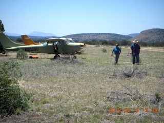 6 7xc. aerial - 'Young International' airstrip (AZ24) - Tommy's airplane and people