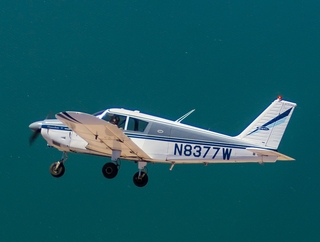 Greg A. photo - N8377W in flight