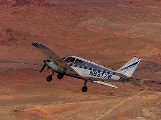 Greg A. photo - N8377W in flight