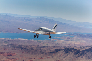 917 7y3. Greg A. photo - N8377W in flight