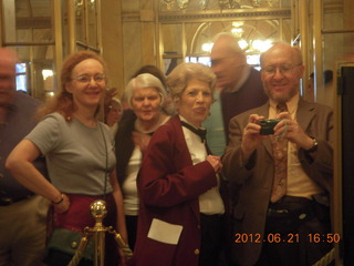 Betsy, Antoinette, and Adam in the mirror at the Academy