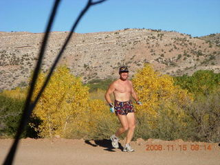 Canyonlands Murphy hike - Adam running (tripod)