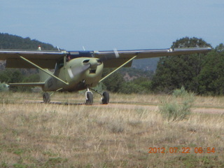 aerial - 'Young International' airstrip (AZ24) - Tommy's airplane and people