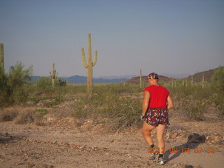 Adam running at Windmill airstrip (tripod, back)