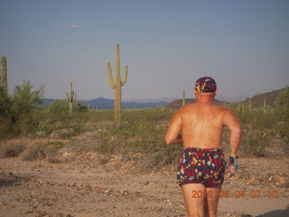 114 804. Adam running at Windmill airstrip (tripod, back)