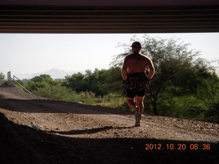 Canyonlands National Park - Murphy run - Adam running - back (tripod)