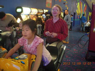 Cecelia playing video game and Betsy