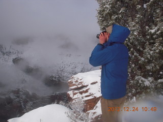 134 84q. Zion National Park - cloudy, foggy Observation Point hike - another hiker at the top