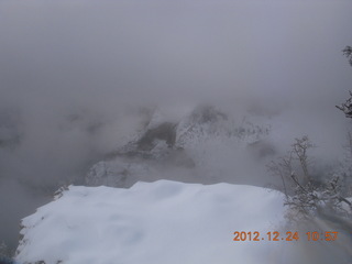 144 84q. Zion National Park - cloudy, foggy Observation Point hike - view from the top