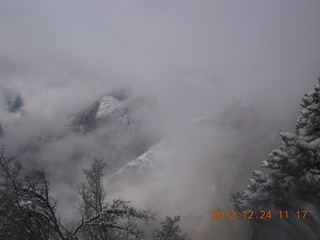 Zion National Park - cloudy, foggy Observation Point hike - another hiker at the top