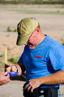 Yaseen's pictures - Adam taking pictures of Cactus Fly-in stickers