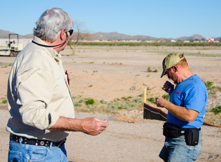 Yaseen's pictures - Jim G and Adam putting on Cactus Fly-in sticker