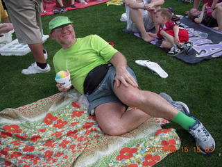 Adam watching baseball game with rainbow ice cone