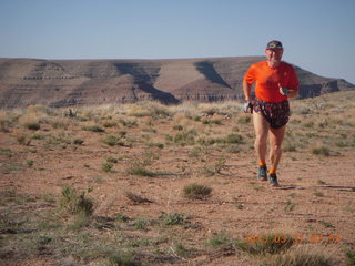 Adam running at Grand Gulch (tripod and timer)