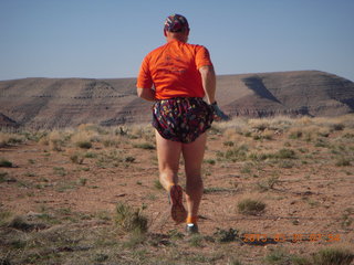 124 87y. Adam running at Grand Gulch (tripod and timer)