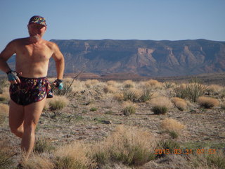 Adam running at Grand Gulch (tripod and timer)