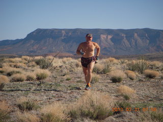 Adam running at Grand Gulch (tripod and timer)