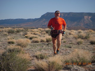 Adam running at Grand Gulch (tripod and timer)