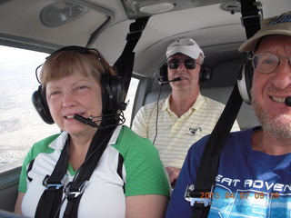 Yaseen's pictures - Adam and Jim G and the video camera on the wing of N8377W